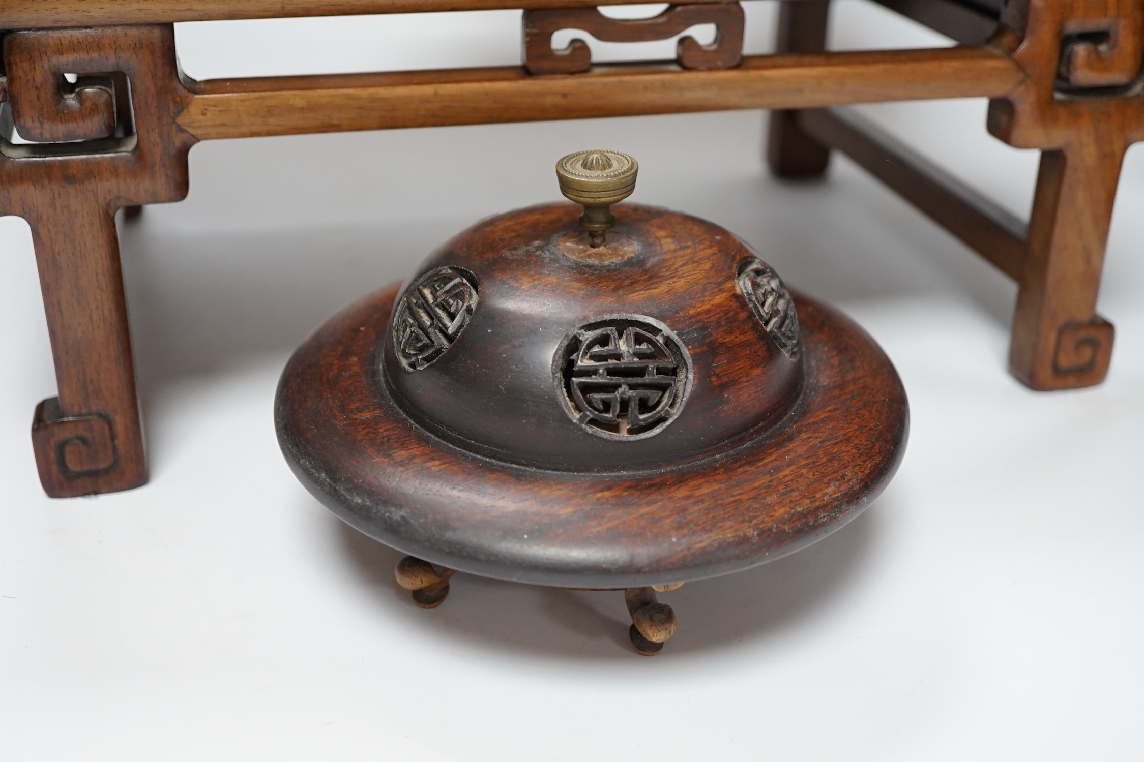 Nine Chinese hardwood vase stands, two hardwood covers and a Chinese hongmu table shaped stand, table 39cm x 25cm x 16.5cm